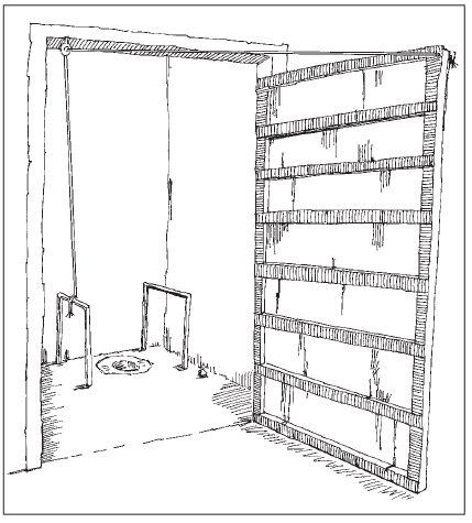 Baño donde se ha fijado una cuerda a la estructura de la puerta mediante un gancho